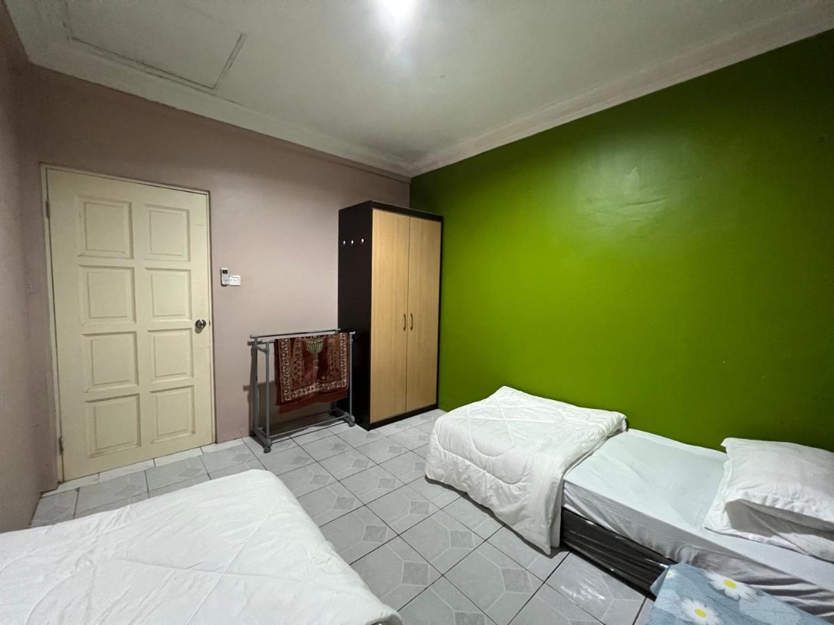 Hanif Homestay กูชิง ภายนอก รูปภาพ