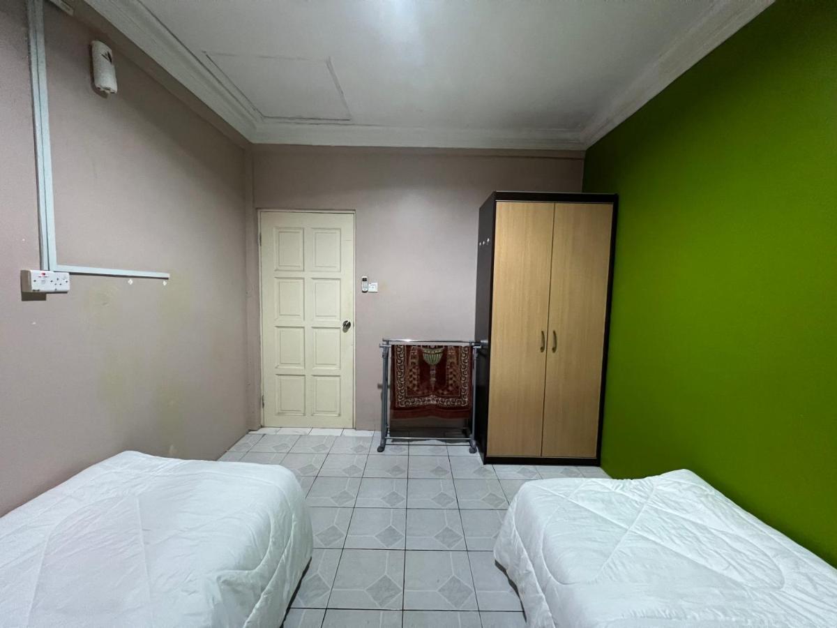 Hanif Homestay กูชิง ภายนอก รูปภาพ