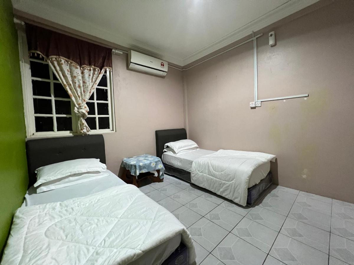 Hanif Homestay กูชิง ภายนอก รูปภาพ